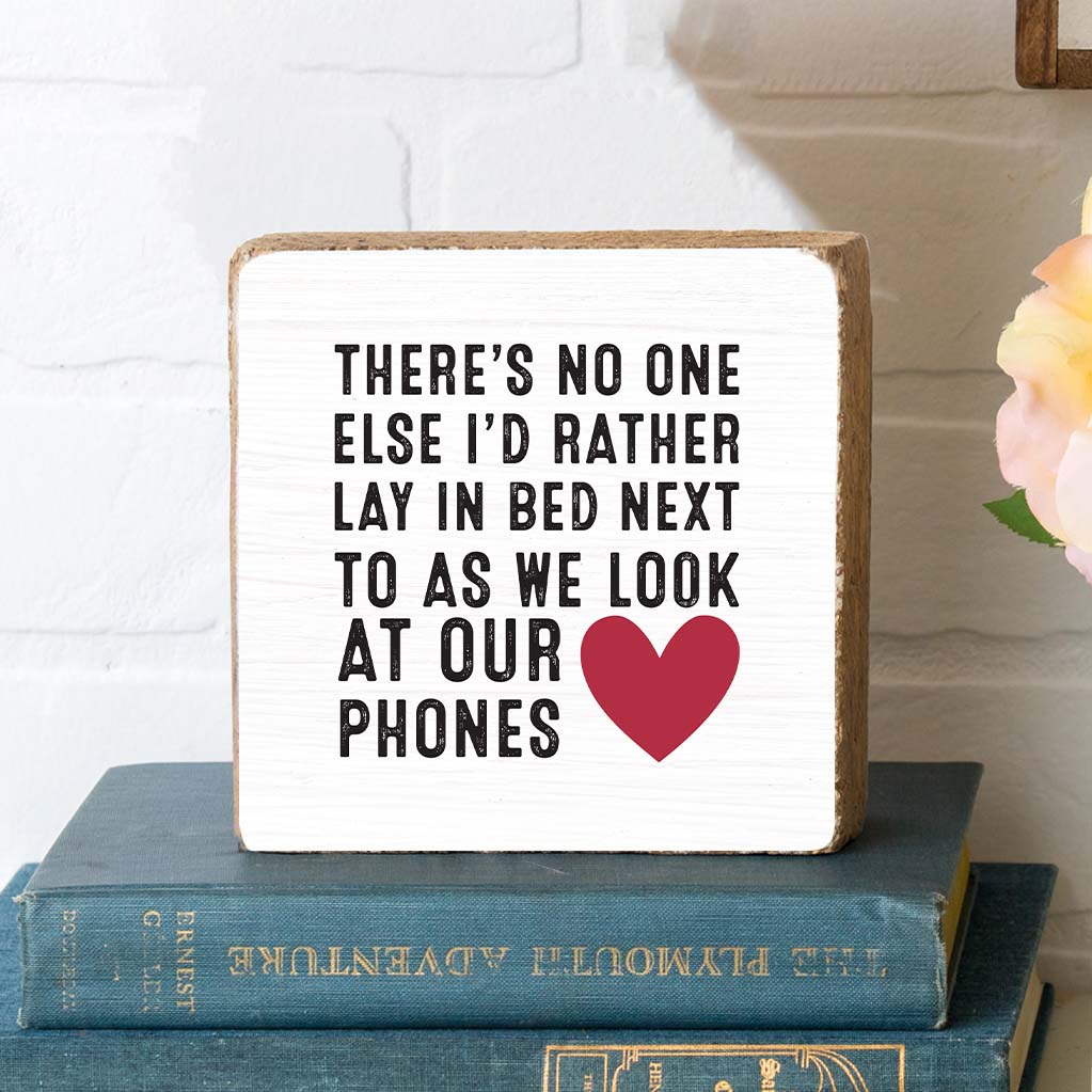 Look At Our Phones